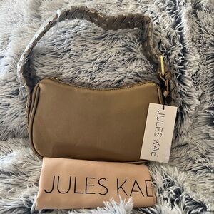Jules Kae vegan leather Deliah bag in gold color